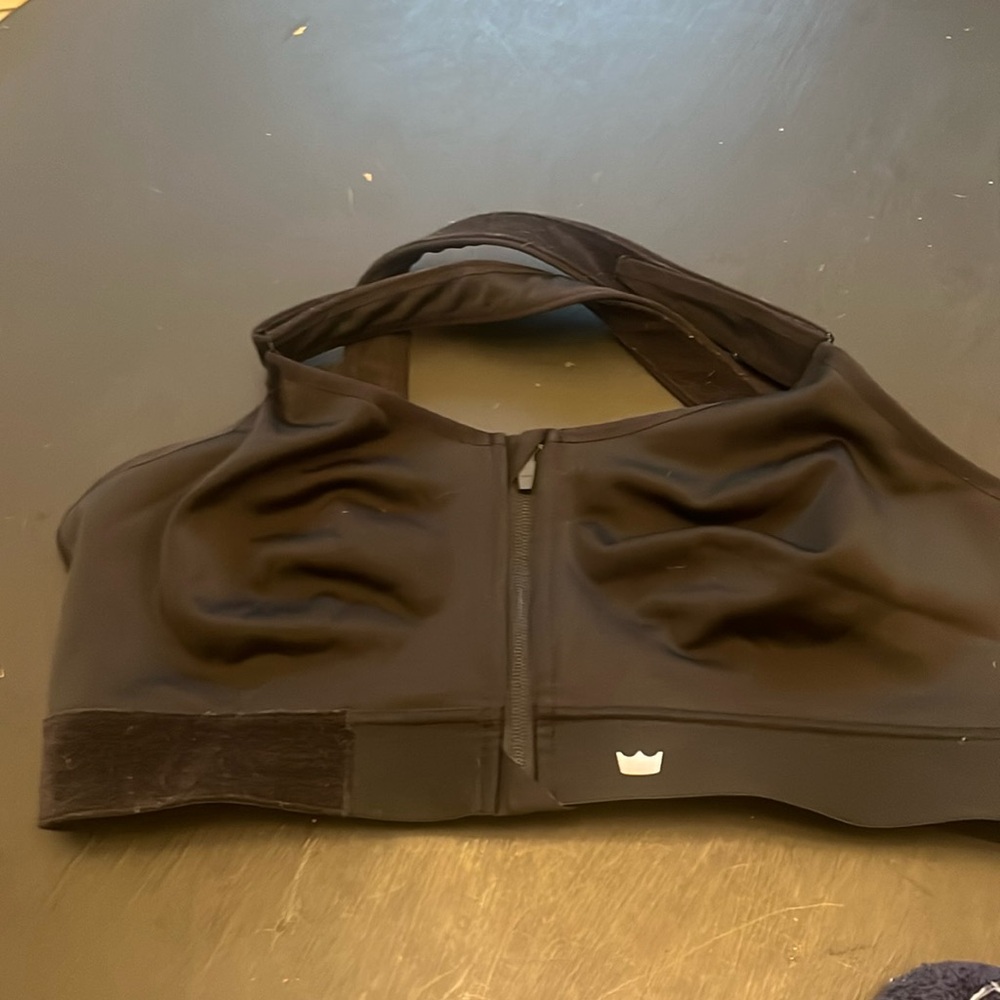Black SHEFIT sports bra.